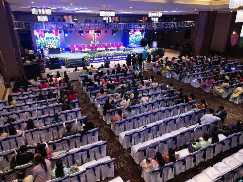 Corporate seminar audience facing the stage