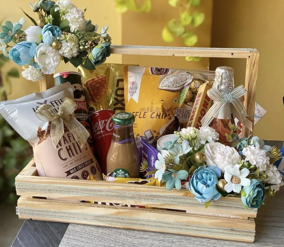 Curated wedding gift hamper with flowers